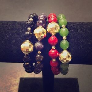 Set of 4 stretch beaded bracelets.